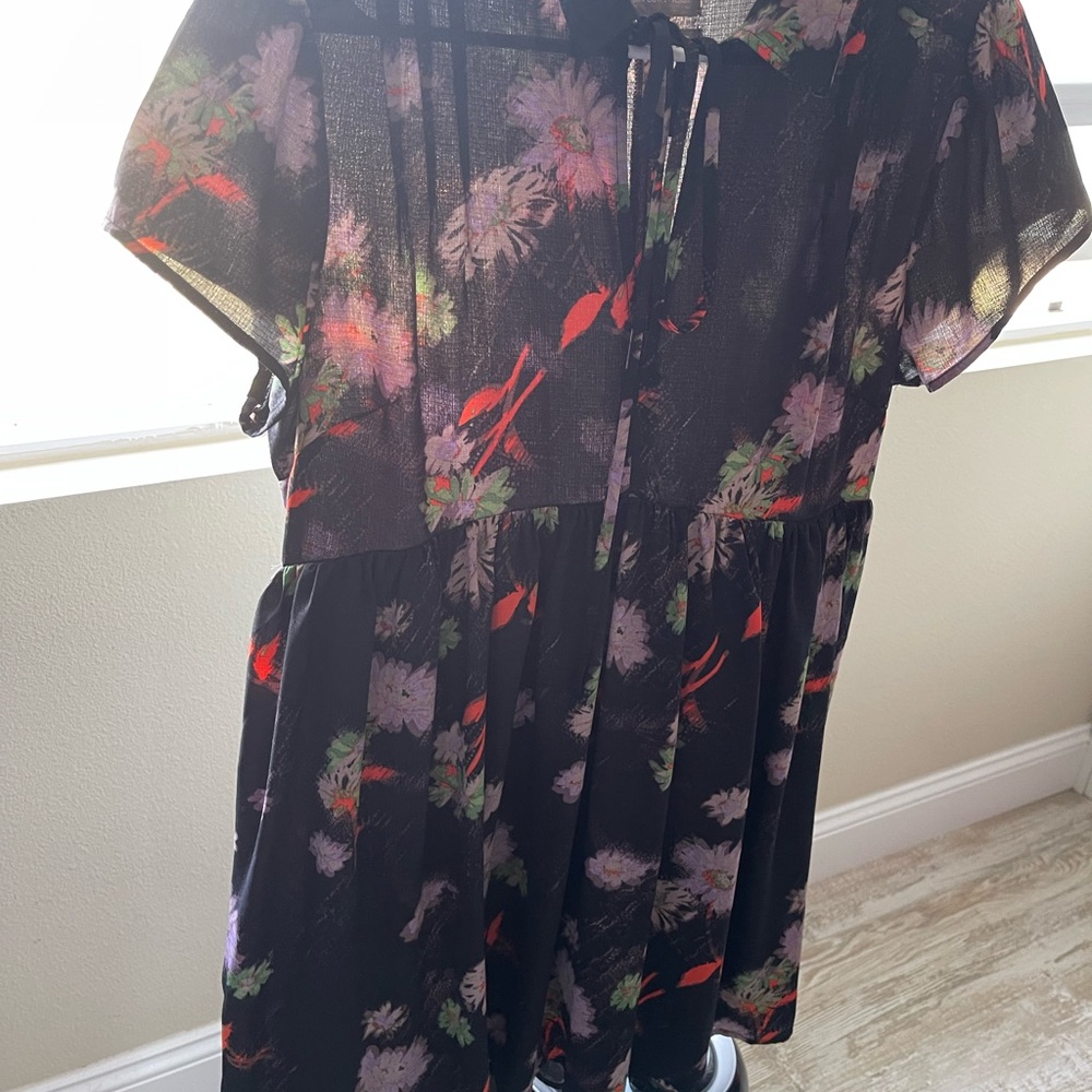 Urban Outfitters babydoll dress. Black with purple flowers
